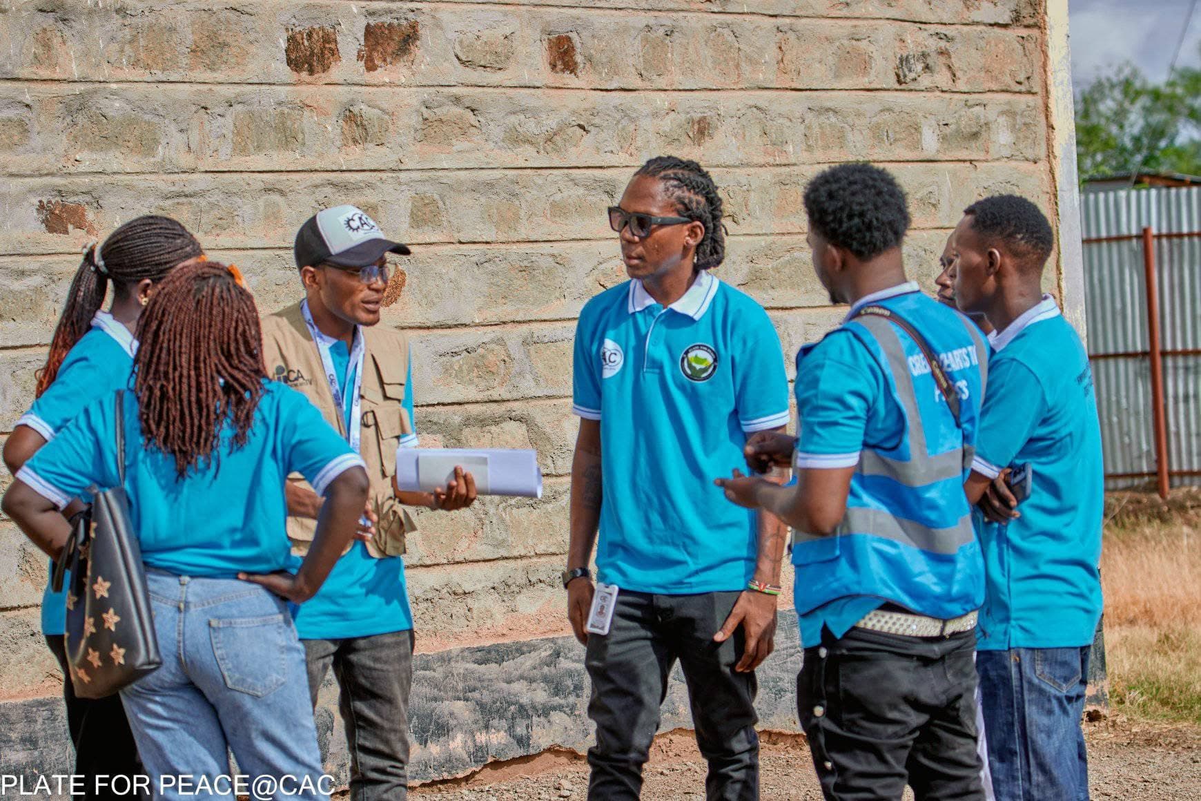 A young woman speaking confidently to a group