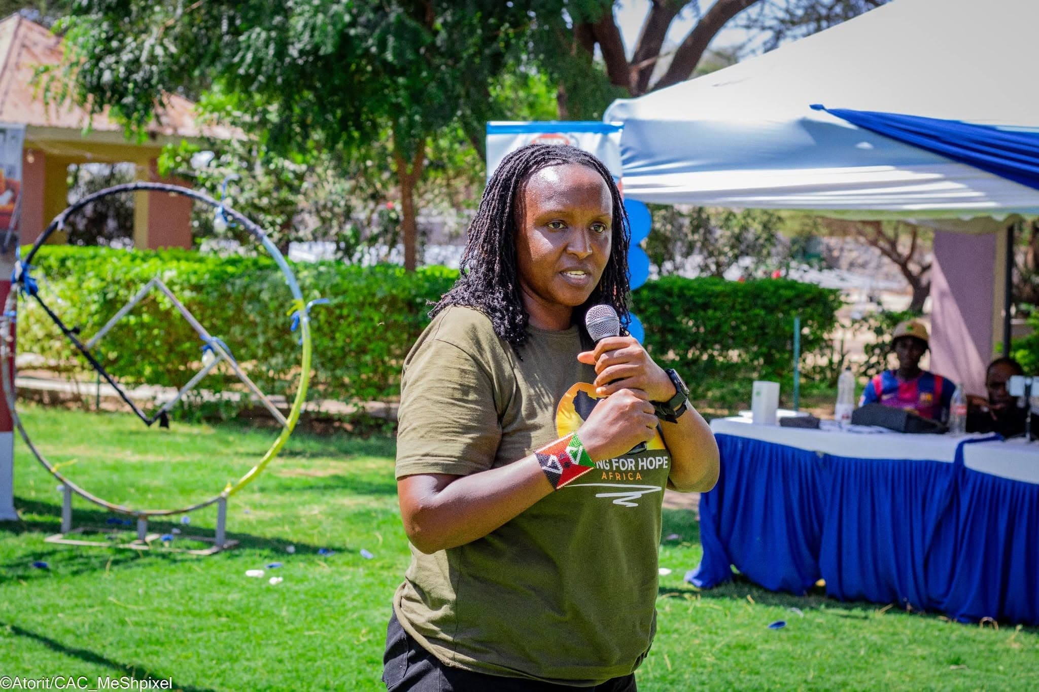 A young person presenting an idea to peers